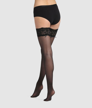 Dim Up Sexy 25D semi-opaque hold-up stockings with black lace garter