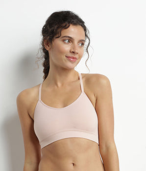 Seamless light bra in almond pink Dim Sport