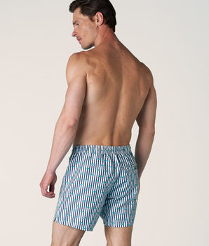 White swimming shorts with blue stripes