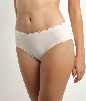 Women's stretch cotton briefs in Beige with a thin waistband Dim Icon Essentiel